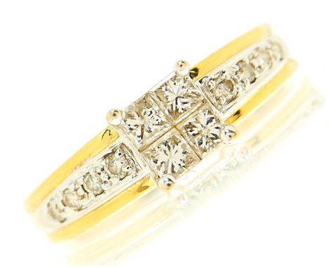 A diamond ring with cluster of four princess cut diamonds and graduated line of diamonds to each shoulder, in two colour 18ct