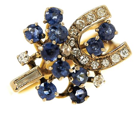 A sapphire and diamond cocktail ring in 14ct gold, import marked, London, no date letter, 6.9g, size L  Slight signs of wear 