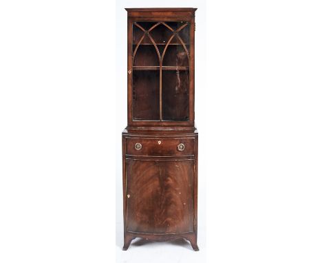 A mahogany bookcase of narrow proportions, second quarter 20th c, in George III style, the upper part with adjustable shelves