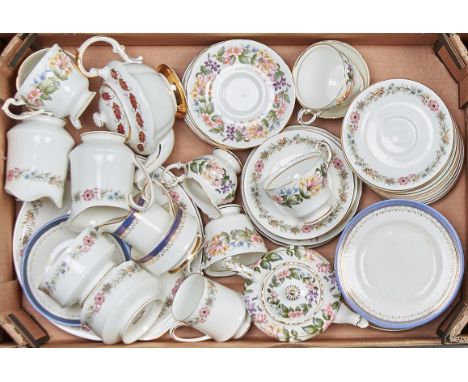 A Paragon Country Lane pattern part tea service,&nbsp; comprising five cups, six saucers, sugar bowl and cream jug, a Paragon