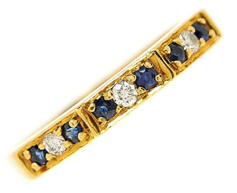 A nine stone sapphire and diamond ring in 18ct gold, London 1978, 3.3g, size Q  