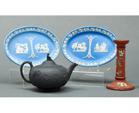 A Wedgwood Rosso Antico candlestick decorated with Chinese plants, 19th c, 17cm h, impressed mark and a Wedgwood black basalt