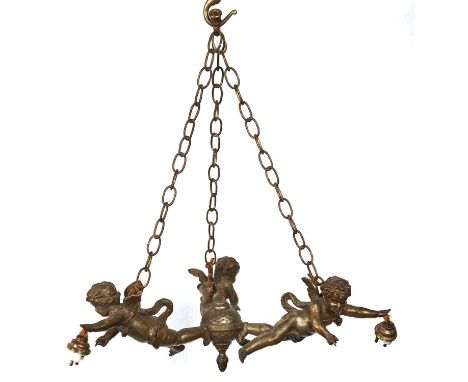 A French spelter gilt and oxidised three cherub chandelier, c1920, suspended from chains, each cherub 21cm l and a contempora