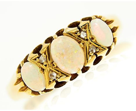 An opal and diamond ring, early 20th c, in 18ct gold, Birmingham, no date letter, 3.2g, size S½  Two of the opals with dull p