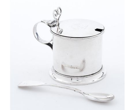 A Victorian silver drum mustard pot with ring handle, crested, blue glass liner, 7.5cm h, maker J G &amp; Sons, Birmingham 18