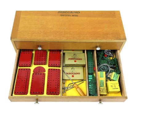 A Meccano outfit No 10 set c.1950s, complete with instructions in green branded folder and a manual, a number of the parts ar