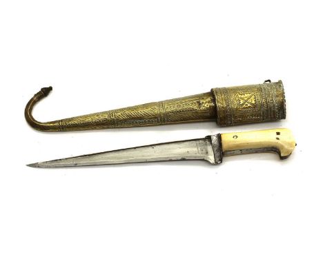 An Afghan Choora Dagger,  19th century, 10.5in blade engraved decoration, bone hilt, in an engraved brass scabbard terminatin