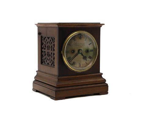 A mahogany W. E. Moser patent mantel clock,  early 20th century, the silvered dial signed 'S.Smith and Sons ltd 6, Trafalgar 