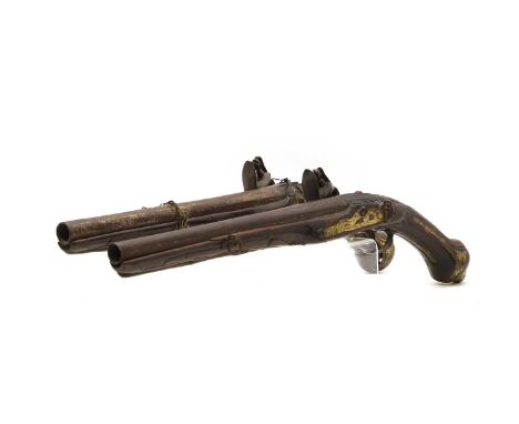 A pair of Ottoman flintlock holster pistols early 19th century, each with a 10 1/4 in barrel stamped with proof marks, the st
