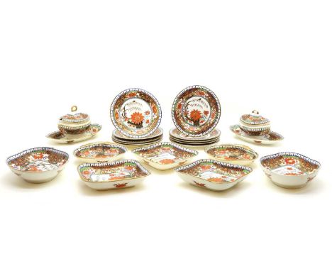 A Minton pottery Imari tea service c.1810, comprising two tureens on stands, 27cm wide, a pair of oval form dish, 28cm wide, 