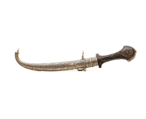 A Moroccan koummya dagger, A20th century, with inlaid wire handle and silver mounts and scabbard,blade 23cmtotal 40.5cmShippi