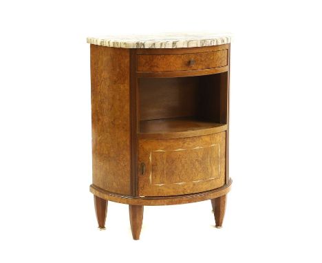 A demi-lune side cabinet, with a variegated marble top, over a drawer and shelf, with a cupboard below, with a stone base, te