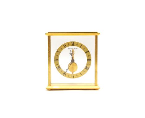 A Jaeger Le Coultre Model 508 mantel clock 1970s, the gilt chapter ring with Roman numerals, suspended in a gilt and brushed 