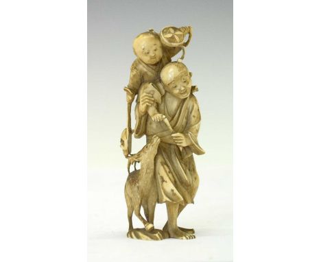 Japanese carved ivory okimono, Meiji period, depicting Fukurokuju and Daikoku, the latter perched upon the former's shoulders