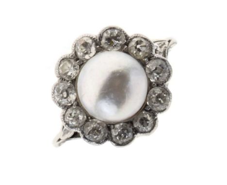 Mabé pearl and diamond cluster ring, the unmarked white metal mount with sizing beads, the pearl of approx 8mm diameter, encl