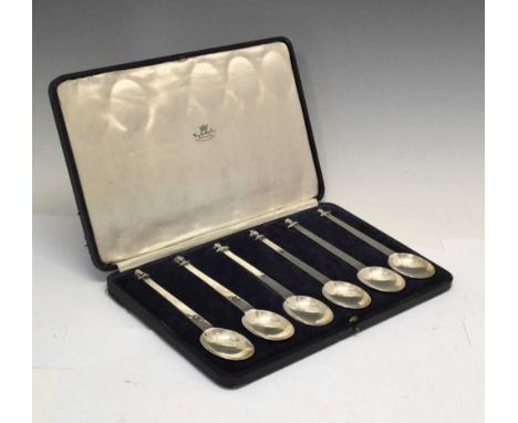 Cased set of six George VI silver spoons in the Puritan manner, the terminals variously modeled as King George I to King Geor
