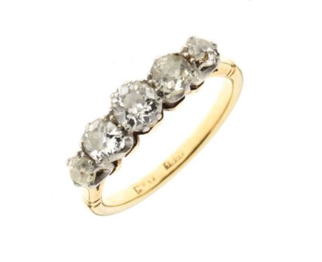 Five stone diamond ring, stamped '18ct', the graduated old brilliant cuts totalling approx 1.1 carats estimated, size M, 3.4g