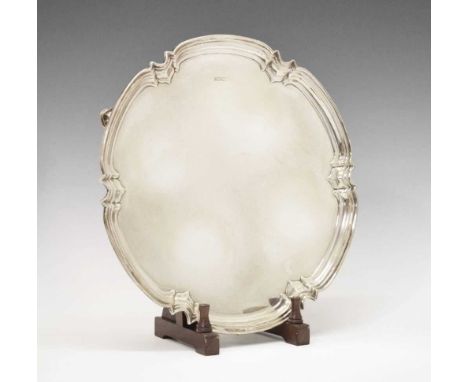 Elizabeth II silver salver with lobed and reeded edge standing on three cast feet, sponsors mark of Cooper Brothers &amp; Son