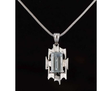 Aquamarine pendant, circa 1970's, tagged '14k', in a white modernist mount, on a chain stamped '585', 6.9g gross approxCondit