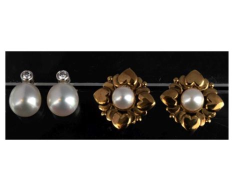 Pair of cultured pearl and diamond ear studs, stamped '750', the 10.5mm diameter, pearl with a brilliant cut above of approx 