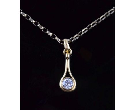 Single stone diamond 18ct gold pendant, the brilliant cut of approx 0.75 carats, on a 9ct gold oval belcher-link chain, penda