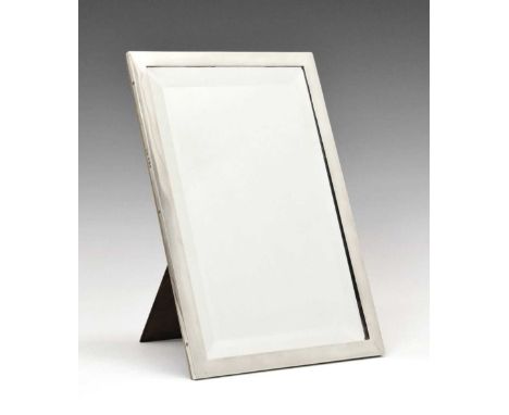 George V silver framed easel table mirror, sponsors mark of H.Terry &amp; Co. Birmingham 1916, 32cm x 22cm.Condition report: 