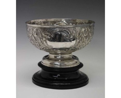 Edward VII silver footed trophy/punch bowl with allover embossed floral decoration, sponsors marks of Moss Morris, London 190