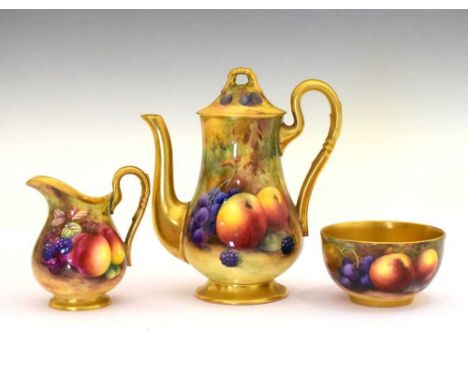 George V Royal Worcester porcelain fruit-painted coffee pot, cream jug and sugar basin, puce printed marks, comprising: pear-