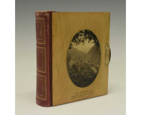 Mauchlineware carte de visite album, the covers decorated with photographic views of Birnam Hill and verses from Macbeth, lea