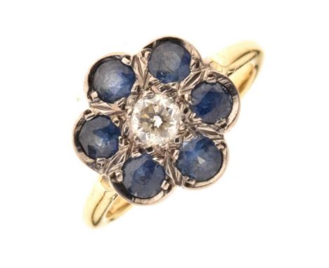 Sapphire and diamond 18ct gold cluster ring, the central brilliant cut diamond of approx 0.25 carats, enclosed by six round c