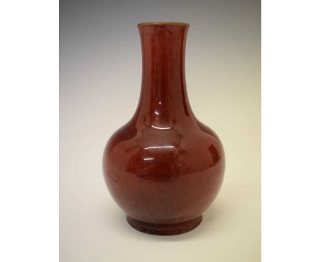 Sang de boeuf glazed pottery vase of bulbous form on circular foot, 16.5cm highCondition report: Appears sound, however, UV l