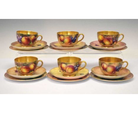 Six Royal Worcester porcelain fruit painted cups, saucers and plates, circa 1960s, comprising four cups and two plates signed