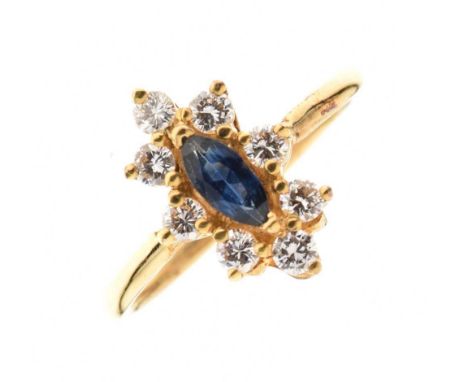 Sapphire and diamond cluster ring, the yellow mount unmarked, the marquise cut sapphire enclosed by eight brilliant cuts tota