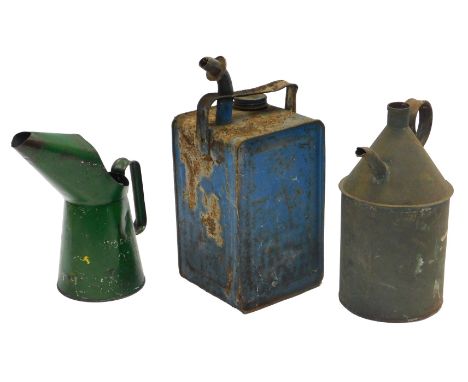 A Valor paraffin can, a one quart oil can, possibly BP, and another. (3)