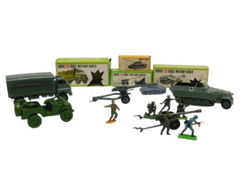 A group of Airfix military related vehicles, 1:32 scale, to include a German half track hand mag personnel carrier, a Bedford