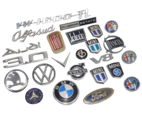Various car badges, including Skoda, BMW, VW, Lancia, Mini, Volvo, etc. (1 tray)