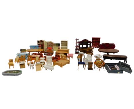 A group of doll's house furniture, to include sideboard, dining table, chest of drawers, various chairs, longcase clock, baby