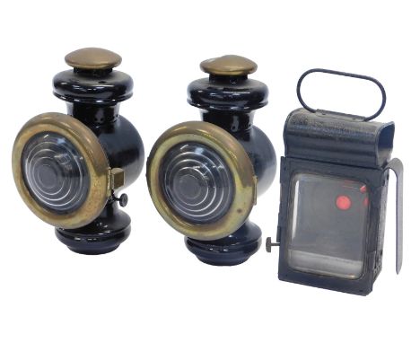 Various lamps, including a near pair of Champion brass and metal car lamps, and a Victorian carriage lamp. (3)