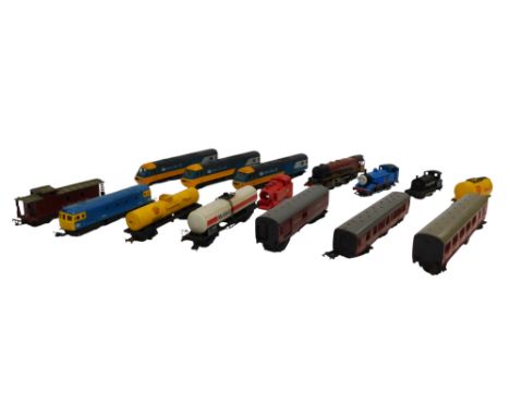 A group of Hornby and other locomotives and rolling stock, together with coaches, a Hornby OO gauge Thomas the Tank Engine lo