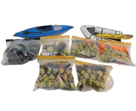 Various Action Man accessories and clothing, including kayak, snowboard, helmets, weapons, etc. (1 tray)