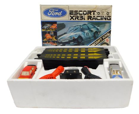A Scalextric C676 Ford Escort XR3I Racing slot car set, boxed.WARNING! This lot contains untested or unsafe electrical items.