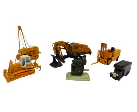 Unboxed diecast excavators and forklifts, including a Joal Caterpillar forklift, a Komatsu PC60 loading shovel, a Caterpillar