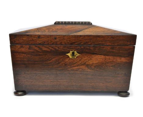 Early 19th Century Rosewood Tea Caddy Sarcophagus form with brass escutcheon, opening to reveal a red velvet interior over a 