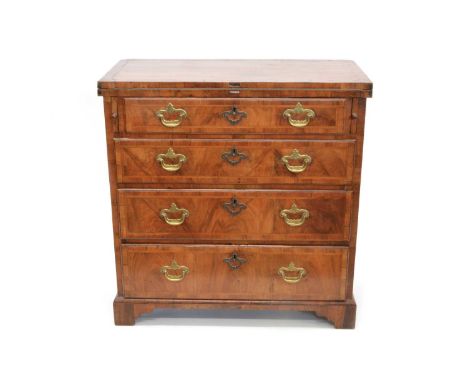 18th Century Walnut Bachelors Chest of Drawers Rectangular cross-banded and feather-banded top with inverted corners enclosin
