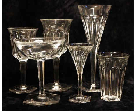 Suite of Baccarat Glass In malmaison pattern with panel cut bowls and hexagonal feet, to include eleven champagne flutes, ele