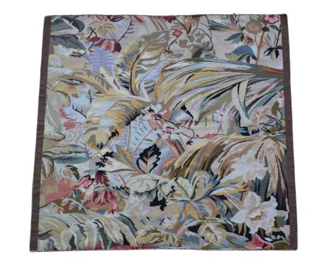 20th Century Floral Embroidered Panel Depicting flowers, leaves and other foliage in natural tones within a brown border,121c