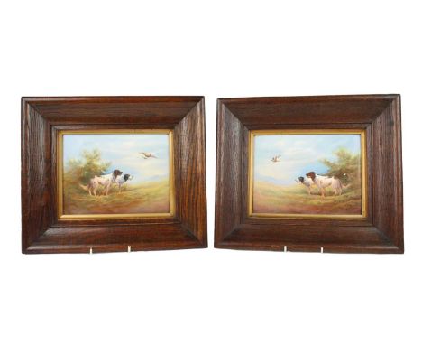 Pair of Crown Devon plaques signed R. Hinton Rectangular porcelain plaques, each painted with two gun dogs watching flying pa