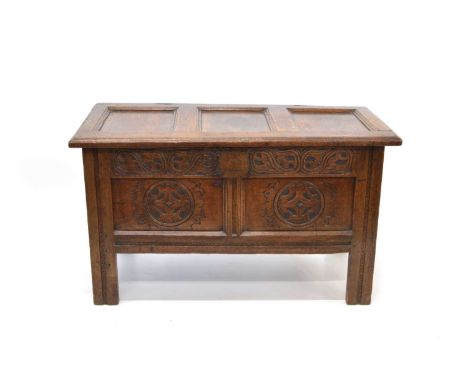18th Century and Later Carved Oak Coffer Three panel top enclosing a fitted candle box to the right side of the interior, ove