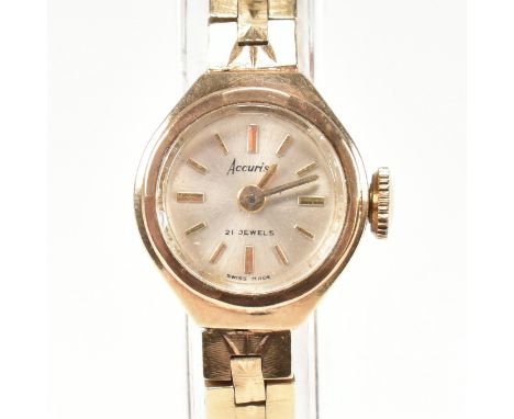 9ct gold hallmarked ladies dress watch and bracelet strap. The wristwatch and strap hallmarked for London and stamped 9  375.