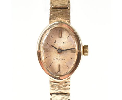 9ct gold hallmarked ladies dress watch and bracelet strap. The wristwatch and strap hallmarked for London and stamped 375. Ov